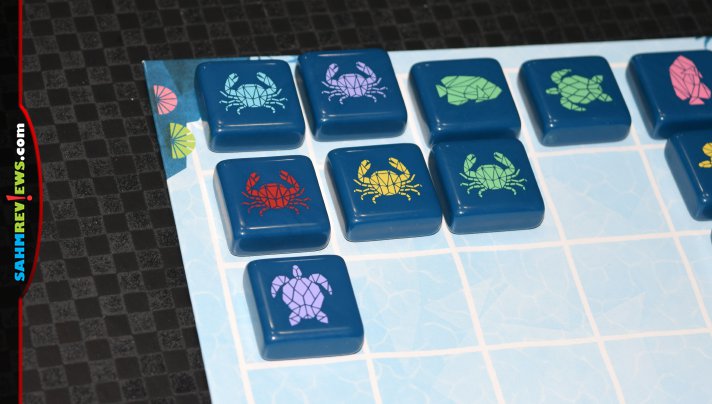 Aqualin is a 2-player strategy game from Thames & Kosmos where opponents are trying to create the largest schools of sea creatures. - SahmReviews.com
