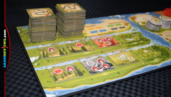 You have to be careful not to travel recklessly downstream or you may find yourself losing valuable resources in The River board game from Days of Wonder. - SahmReviews.com
