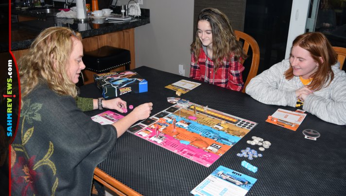 Biff is at it again! Work together to see if you can fix the space-time continuum in Back to the Future: Dice Through Time from Ravensburger. - SahmReviews.com