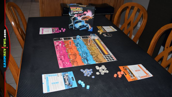 Biff is at it again! Work together to see if you can fix the space-time continuum in Back to the Future: Dice Through Time from Ravensburger. - SahmReviews.com