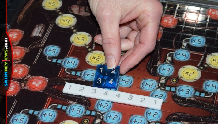 Akumulate is like Scrabble, but with numbers and a bit of math. Oh, it also uses polyominos instead of tiles! Check out this week's Thrift Treasure! - SahmReviews.com