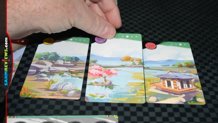 Definitely one of the tallest modern games we've played, Four Gardens by Arcane Wonders utilizes a 3D pagoda to distribute resources! - SahmReviews.com