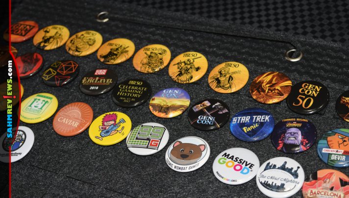 Collecting pins and buttons is one of the things we missed about board game conventions. We're finally displaying them! - SahmReviews.com