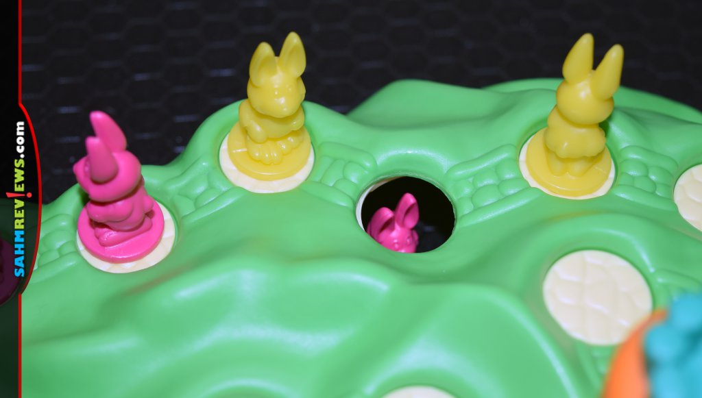 Funny Bunny Game - A pink bunny after it has fallen through a hole in the board.