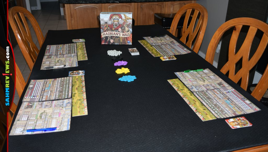 Hadrian's Wall game setup with scoring sheets, cards, game boards and resources. - SahmReviews.com
