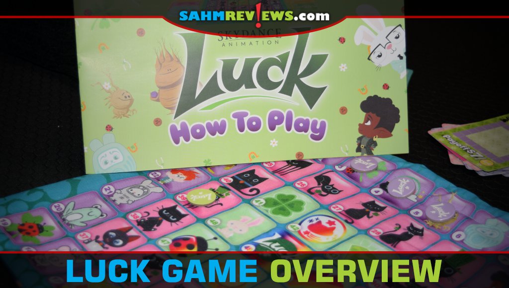 Luck Game - Closeup photo of the rulebook and board.