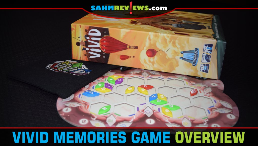 Vivid Memories board game box laying atop a partially filled player board. - SahmReviews.com