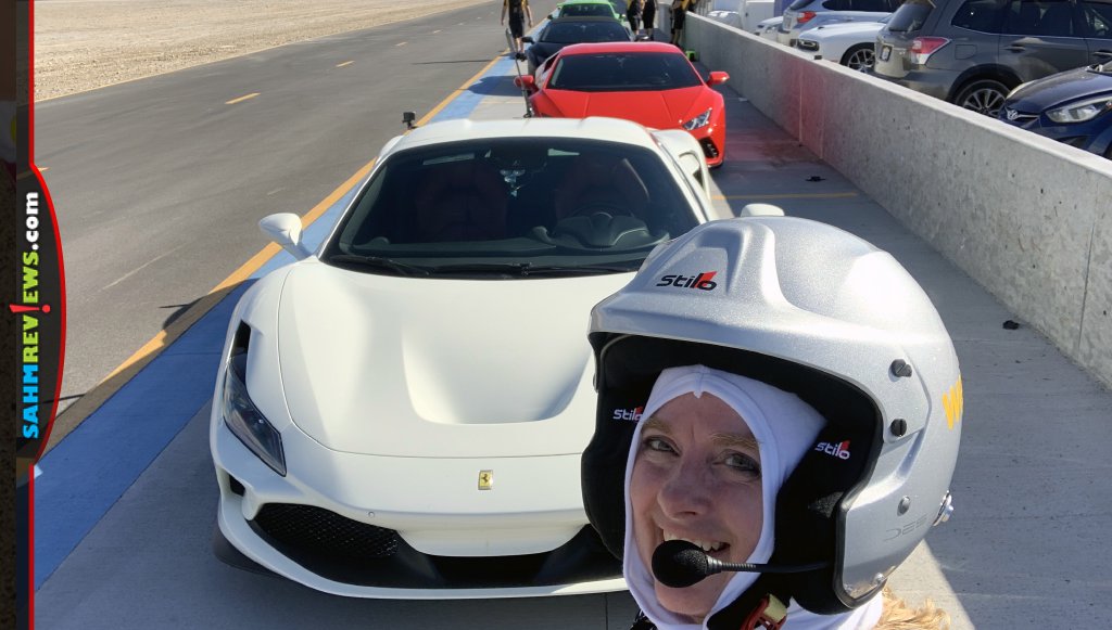 Nicole Brady at Wejo Data in the Desert in front of While Ferrari F8, Red Lamborghini Huracan. - SahmReviews.com