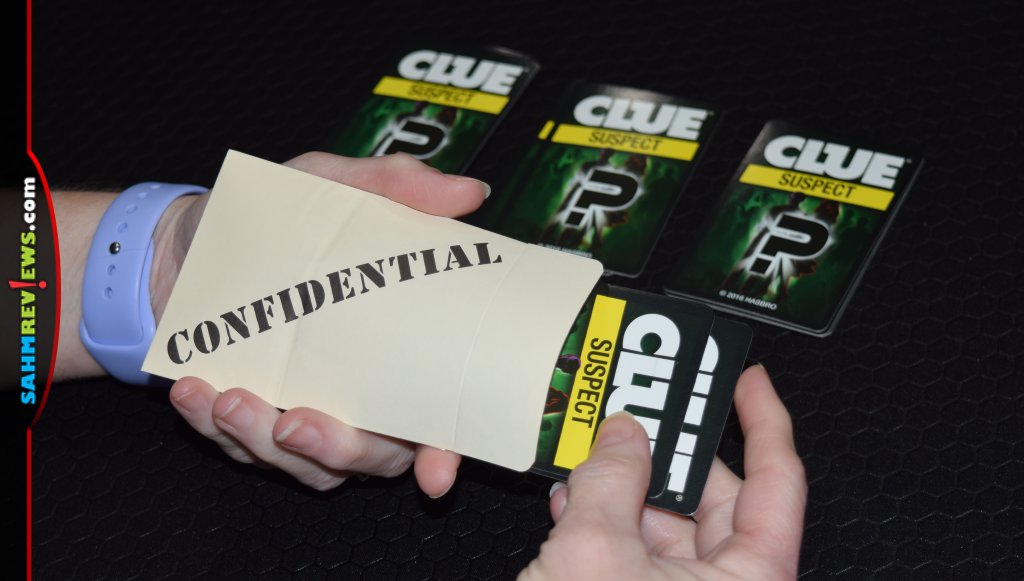 Clue Suspect - Putting cards in the confidential envelope