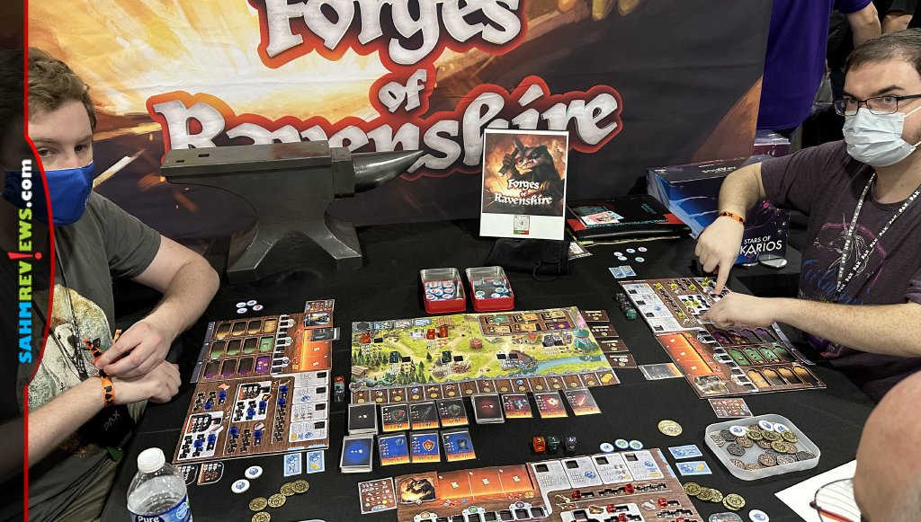 Players testing out a prototype of Forges of Ravenshire at PAX Unplugged. - SahmReviews.com
