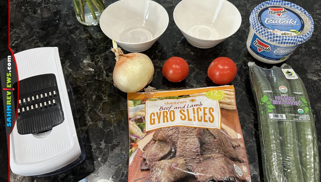 Arrangement of tools and ingredients for gyro salad recipe. - SahmReviews.com