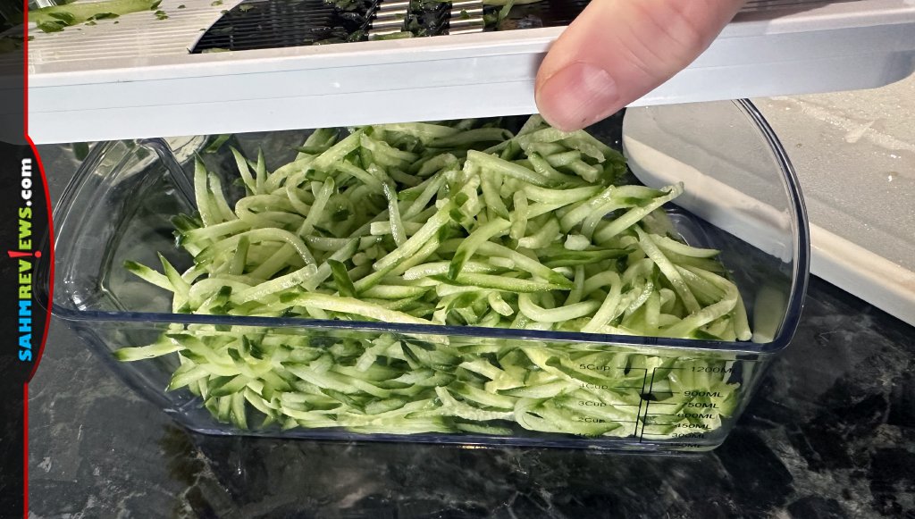 Container of julienned cucumbers to be used as the base for the gyro salad recipe. - SahmReviews.com
