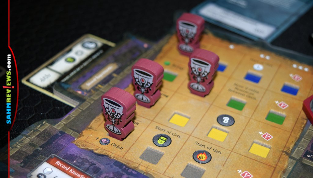 Closeup of Knowledge journal on one player's estate board from My Father's Work game. - SahmReviews.com