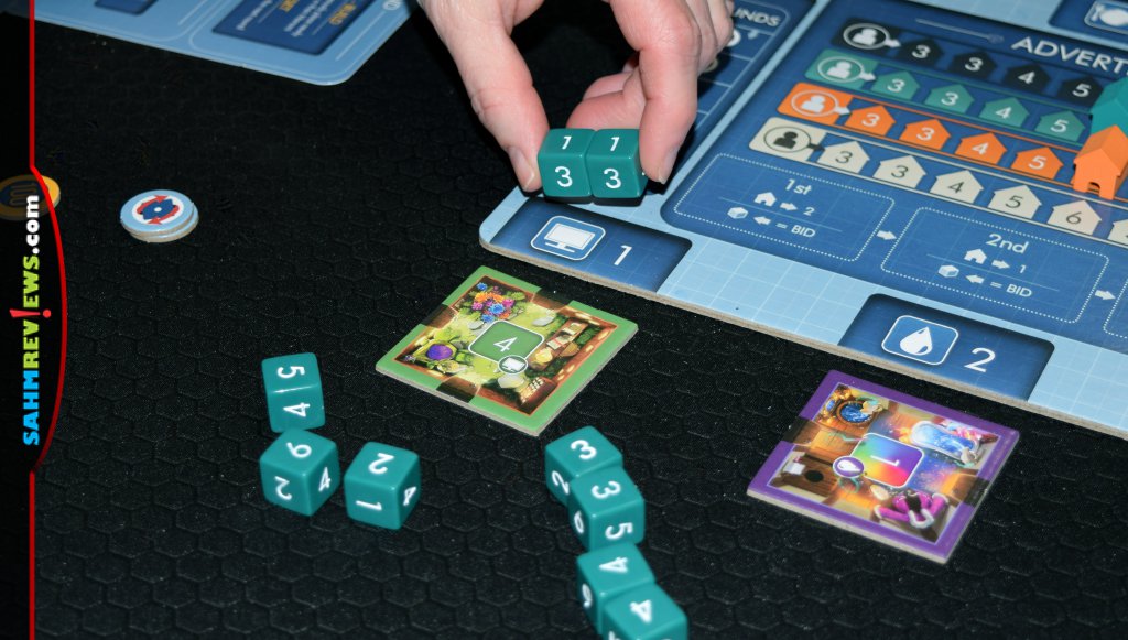 Player using dice to bid on a blueprint room tile on the planning board in Dice Manor from Arcane Wonders. - SahmReviews.com