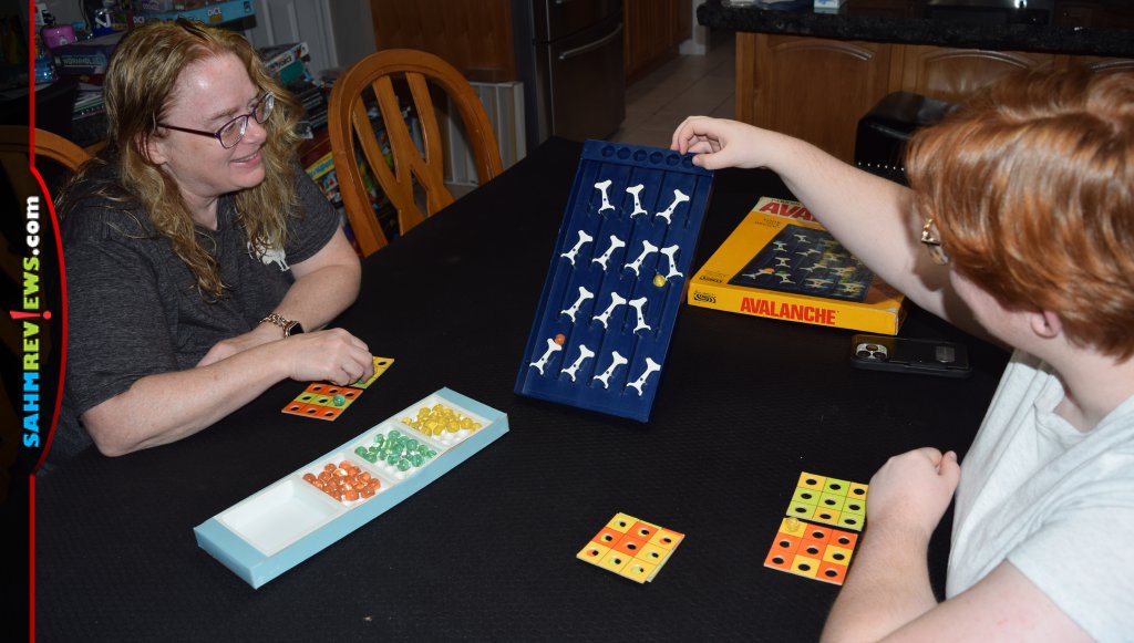 Avalanche Board Game - two women playing the game