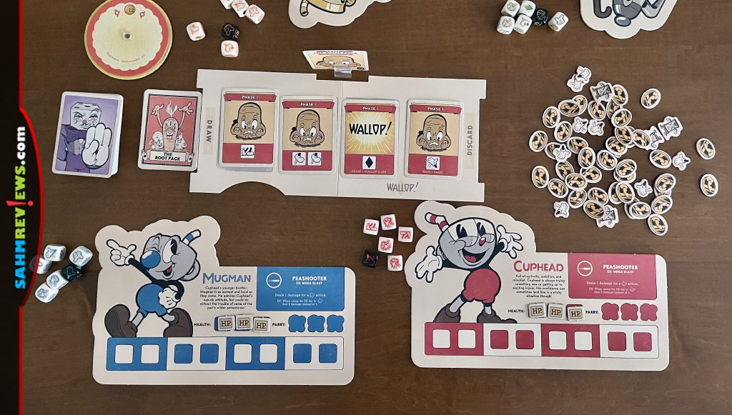 Setup for Cuphead includes unique player boards for each person but a different boss each round. - SahmReviews.com