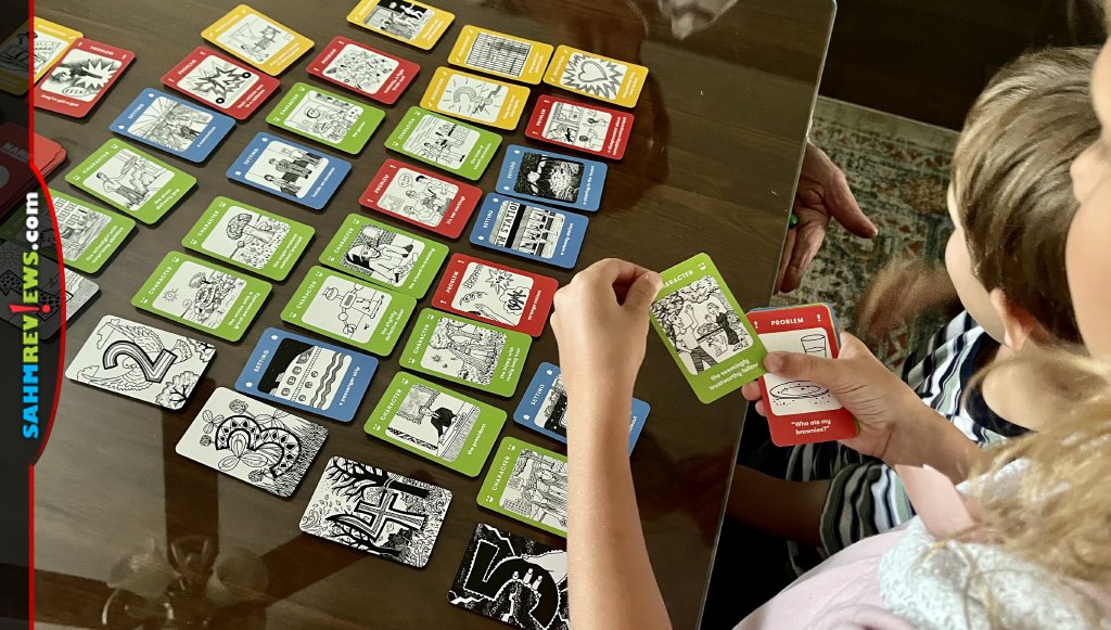 Players lay out their Nanofictionary cards to tell their story - SahmReviews.com