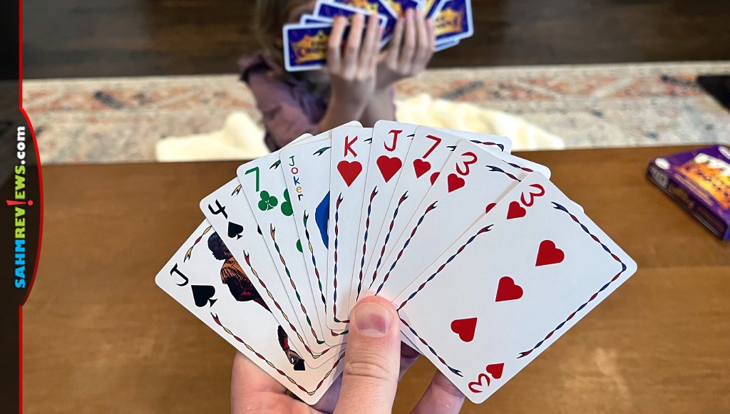 Five Crowns card game - A sample hand of cards with another player in the background